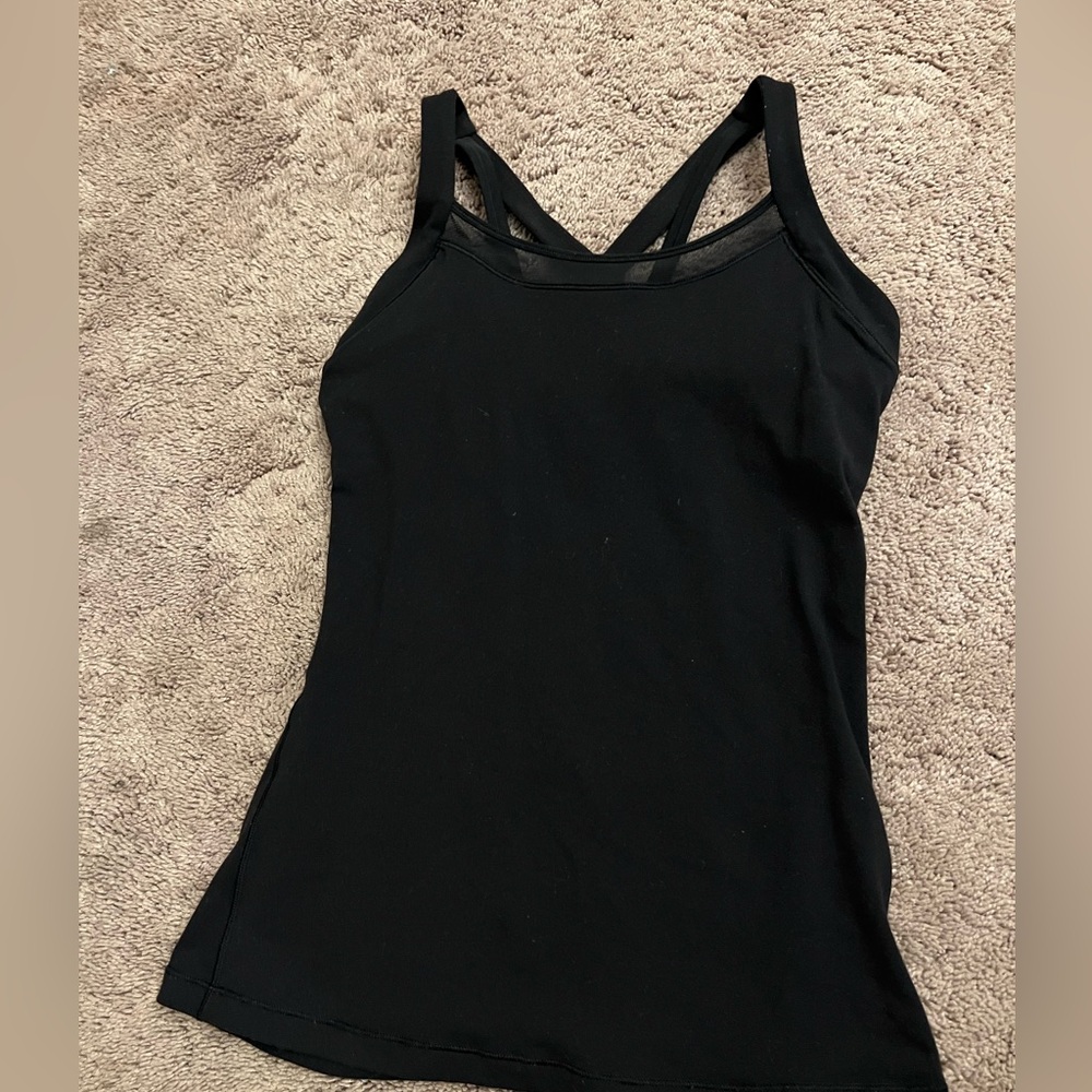 SOLD Black lululemon tank top size 6 with mesh detailing